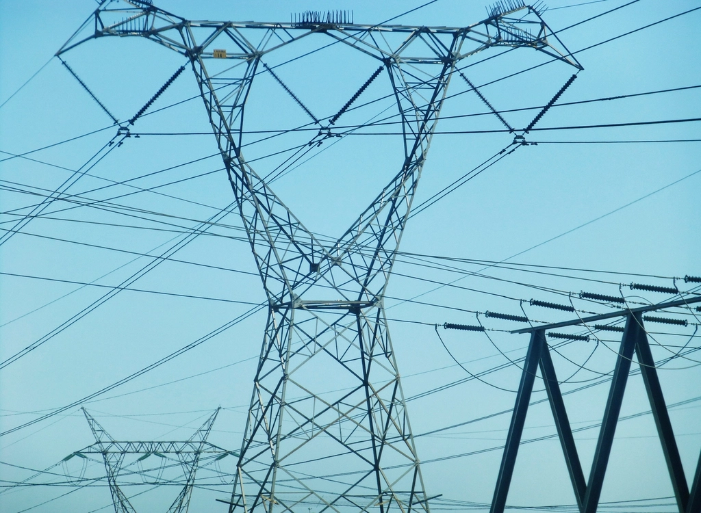 High-voltage electricity transmission towers and power lines